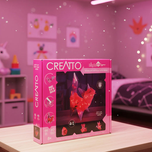 CREATTO toy packaging on a table with a pink room background