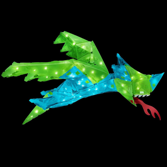 CREATTO dragon 3D puzzle packaging on a table with toys in the background Toy dragon with green and blue colors on a black background