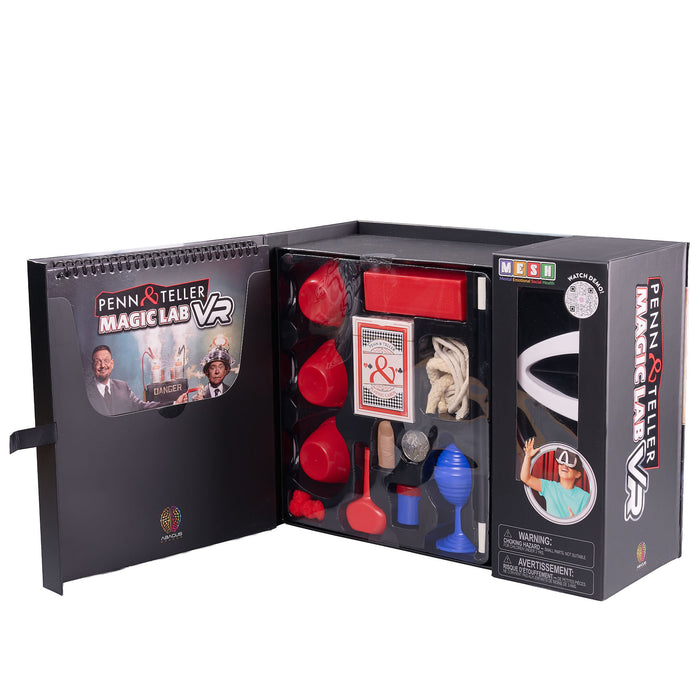 Open box of Penn & Teller Magic Lab VR with various magic props inside. Penn & Teller Magic Lab VR packaging with images of two men and a person wearing a VR headset.