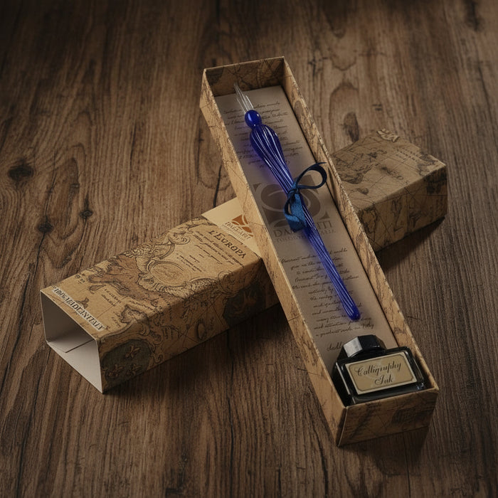 Calligraphy set with blue pen and ink bottle in decorative box on wooden surface