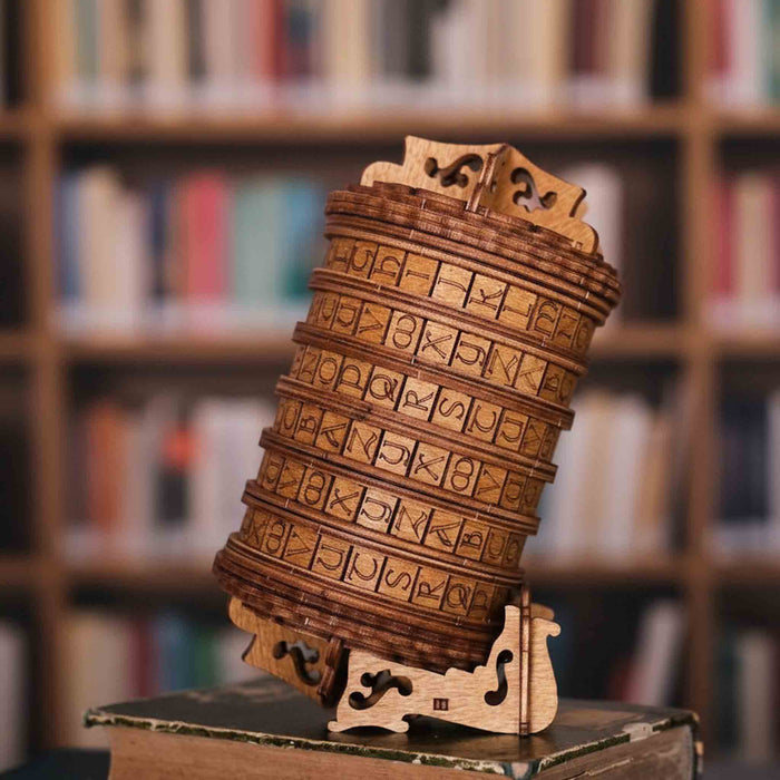 Ugears Escapewelt Cryptex Wooden letterpress wheel Wooden model of a traditional bell with intricate designs against a blurred bookshelf background