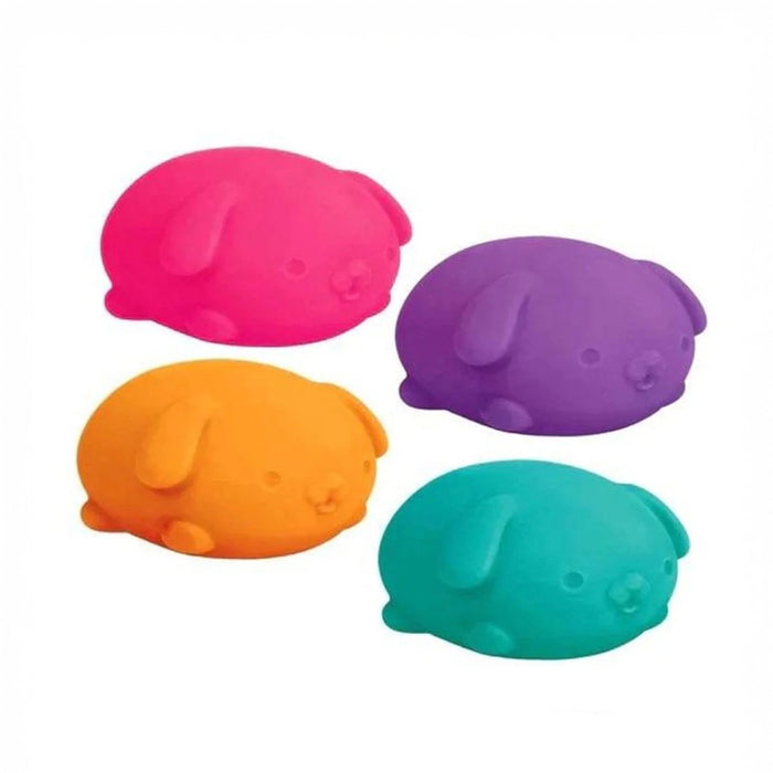 Four colorful pig-shaped objects on a white background