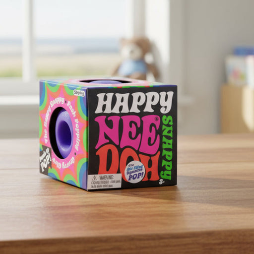 Colorful packaging of Happy Nee Doh Squeaky toy with vibrant design and text.