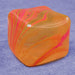 Marbled orange and pink cube swirl on a textured blue background