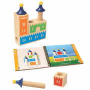 Wooden toy set with castle design and matching book on a white background