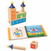 Wooden toy set with castle design and matching book on a white background