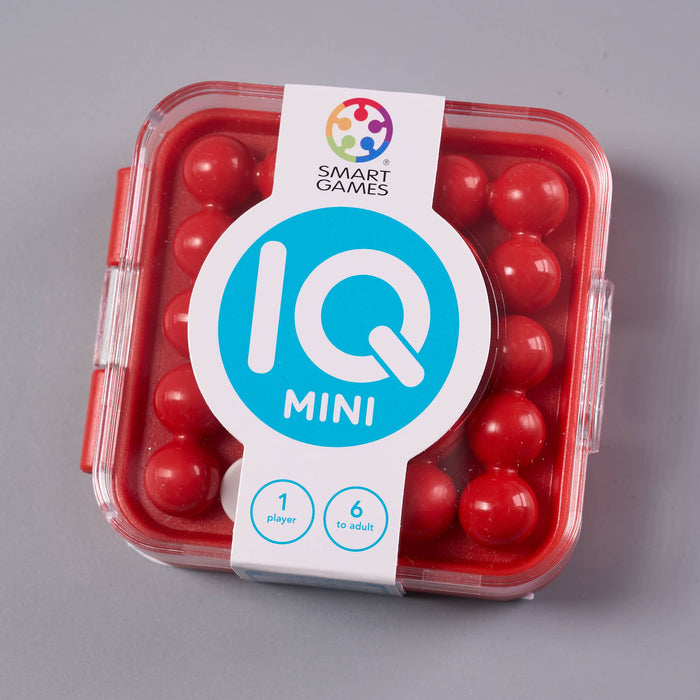 IQ Mini packaging with red balls on a gray background