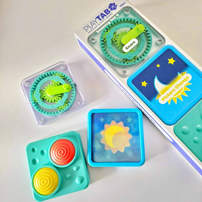 Colorful educational toys with gears and cards on a white background playtab gears
