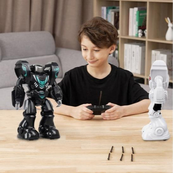 Child playing with robot toys on a table in a living room setting