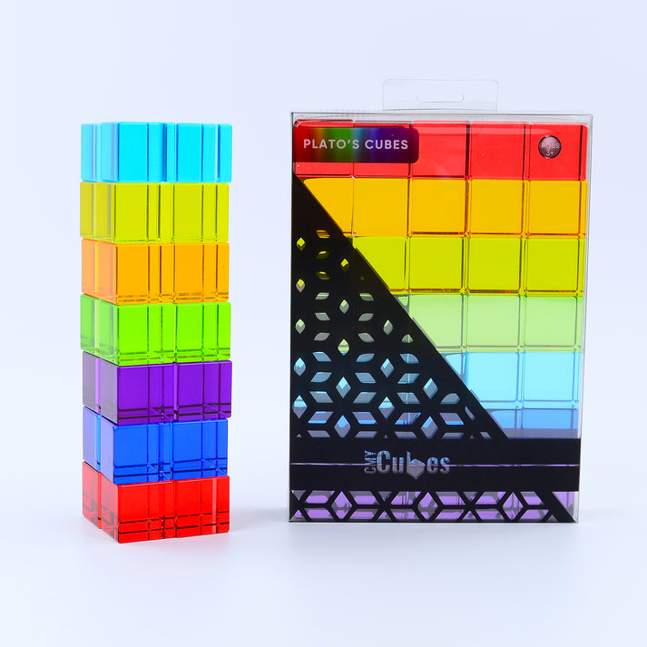 A set of platos cubes colorful, transparent geometric blocks displayed next to their packaging, which is labeled 'Plato's Cubes'.