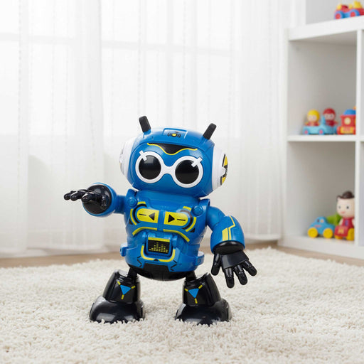 Toy robot on a carpeted floor with a white curtain and shelves in the background