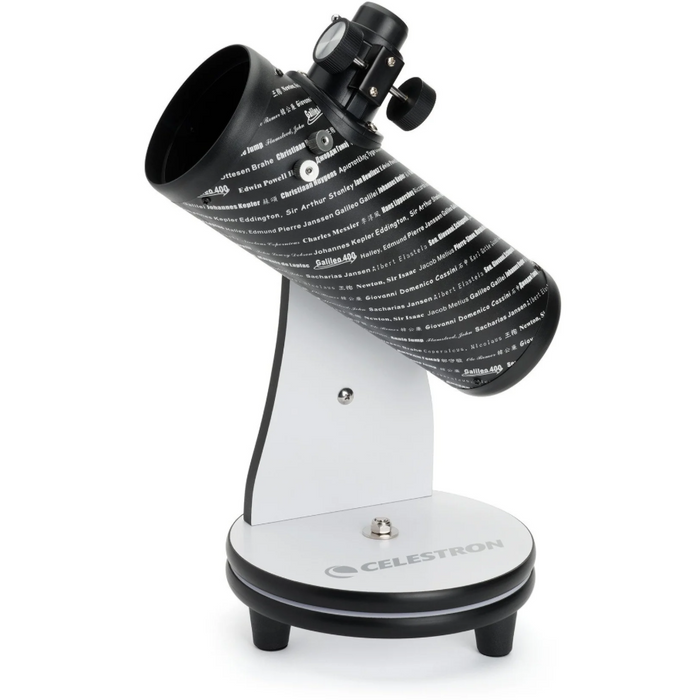 A FirstScope Tabletop Telescope with a black optical tube and a white base, labeled with the Celestron brand.