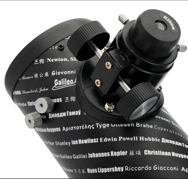 Close-up of a telescope with engraved names on the tube.