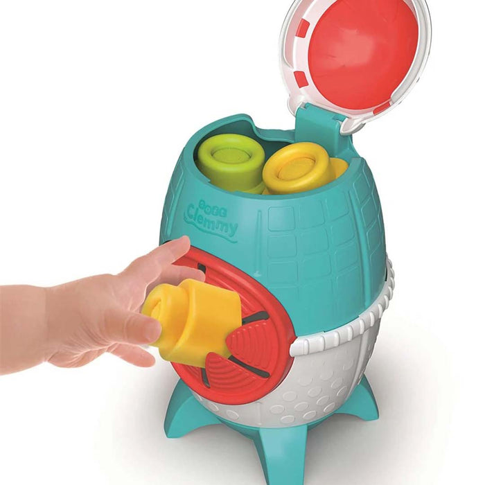 Colorful toy with a hand interacting with it on a white background