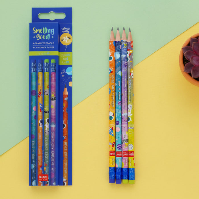 Colorful pencils with cartoon designs on a yellow and green background