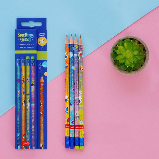 Colorful pencils with cartoon designs on a pink and blue background