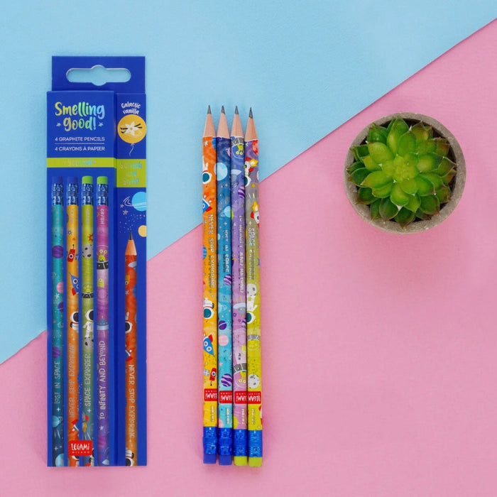 Colorful pencils with cartoon designs on a pink and blue background