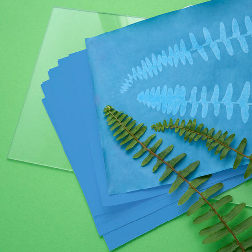 Solar Print paper on green background
