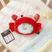 Charlie Crab, a sensory toy on a baby bed