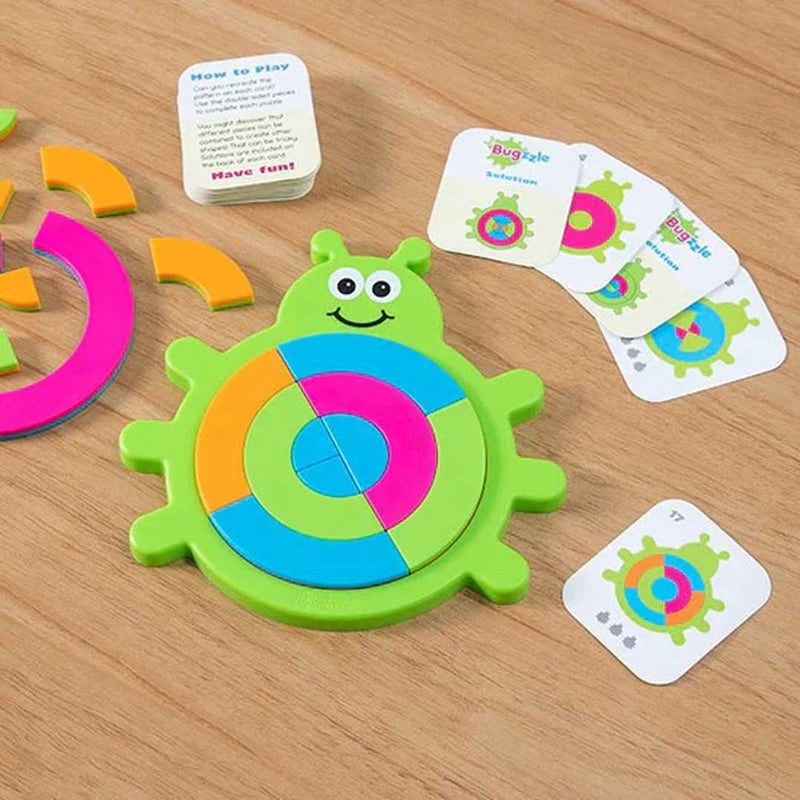 Colorful toy turtle with educational cards on a wooden surface