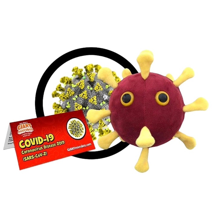 A plush toy in the shape of the COVID-19 virus with a predominantly red body and yellow spikes, featuring black eyes on the surface.