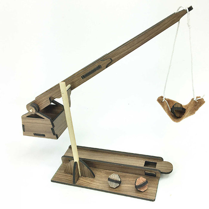 Leonardo da Vinci Trebuchet Wooden toy crane with a swing on a white background