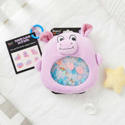 sensory hippo on a baby bed