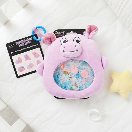 sensory hippo on a baby bed