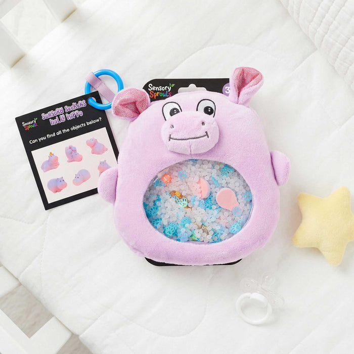 sensory hippo on a baby bed