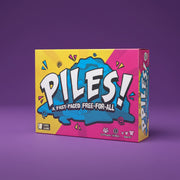 Board game box titled 'PILES!' on a purple background