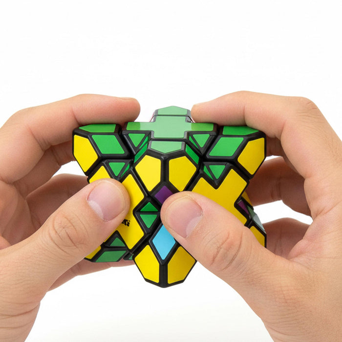 Hands holding a geometric puzzle with green, yellow, and purple colors on a white background