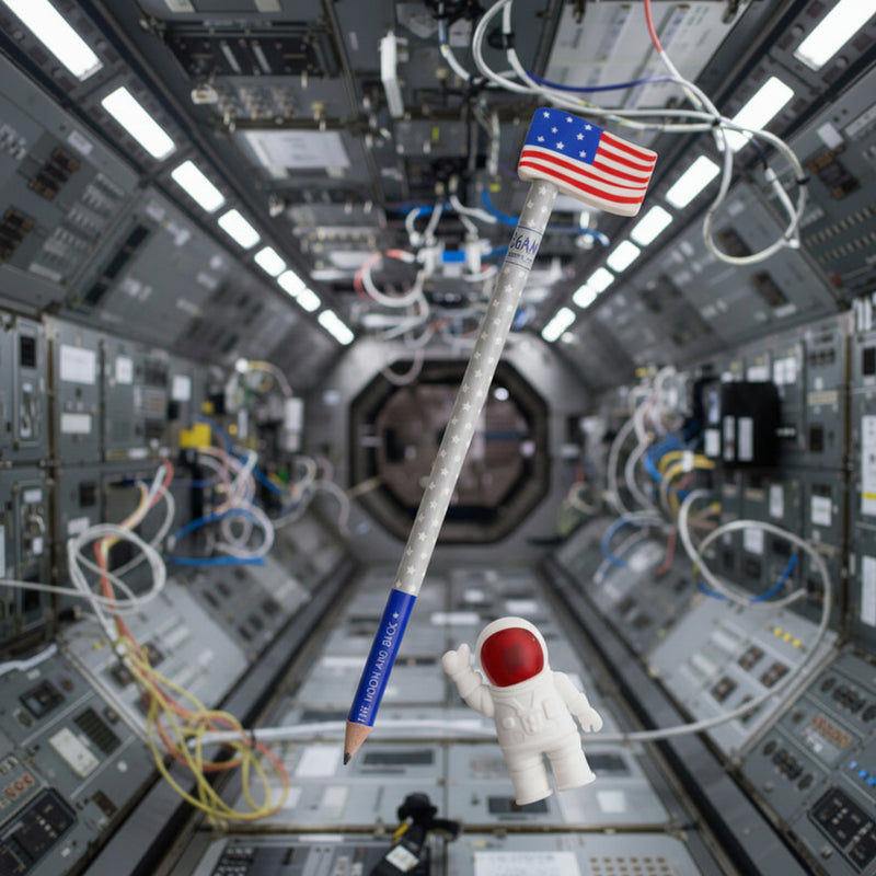 Astronaut figure inside a space shuttle with an American flag on a pencil
