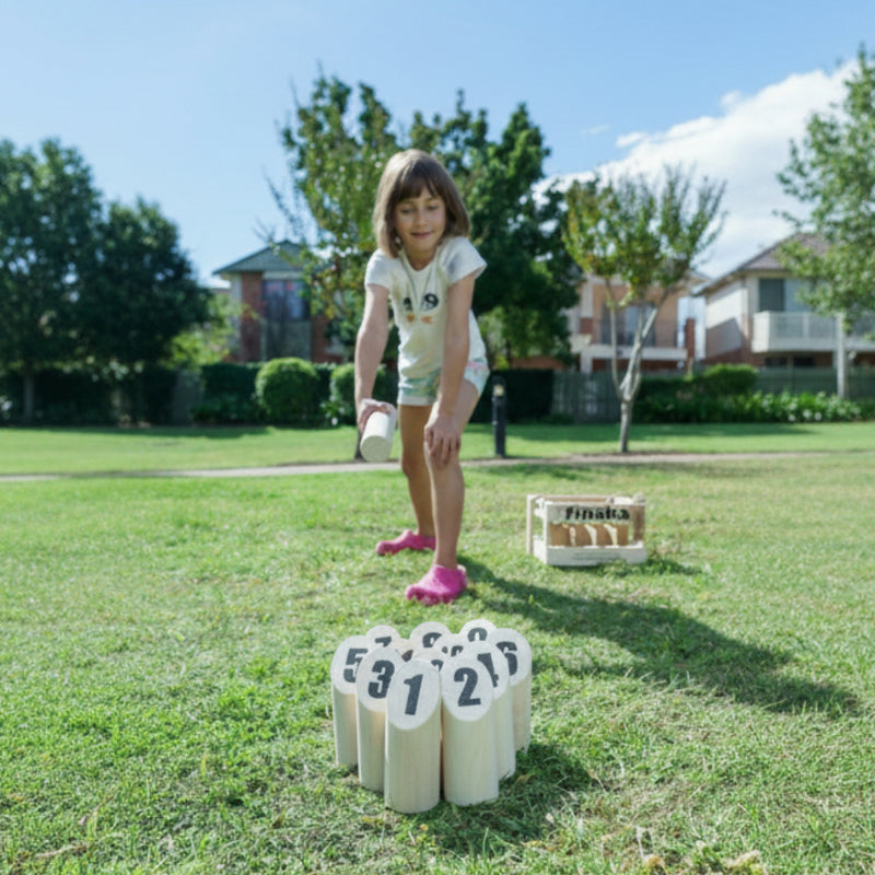 Child playing with a game of finska