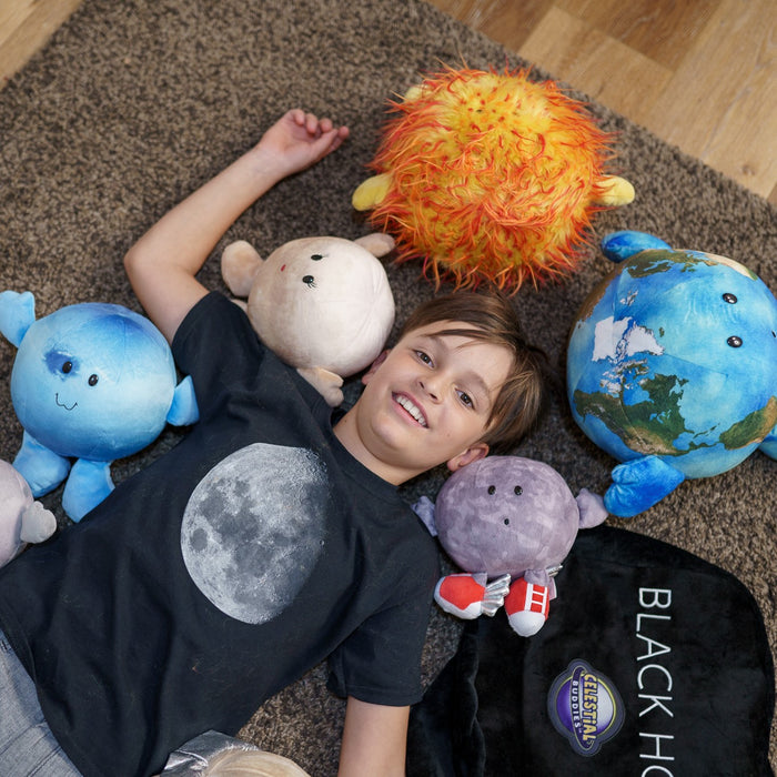 Celestial buddies plush toys flat lay Pluto and Charon