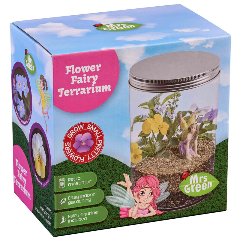 A packaged Flower Fairy Terrarium kit showing a mason jar with flowers and a fairy figurine, labeled for indoor gardening.