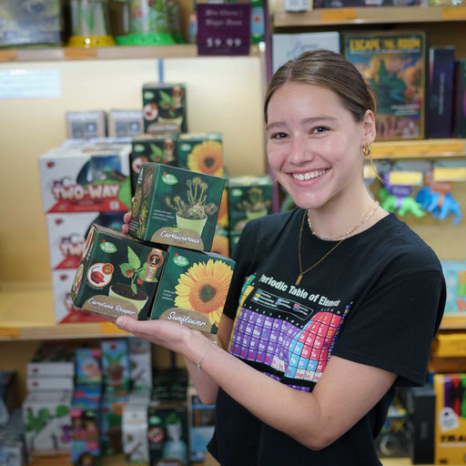 MRS green from professor plums hold by girls at the store 